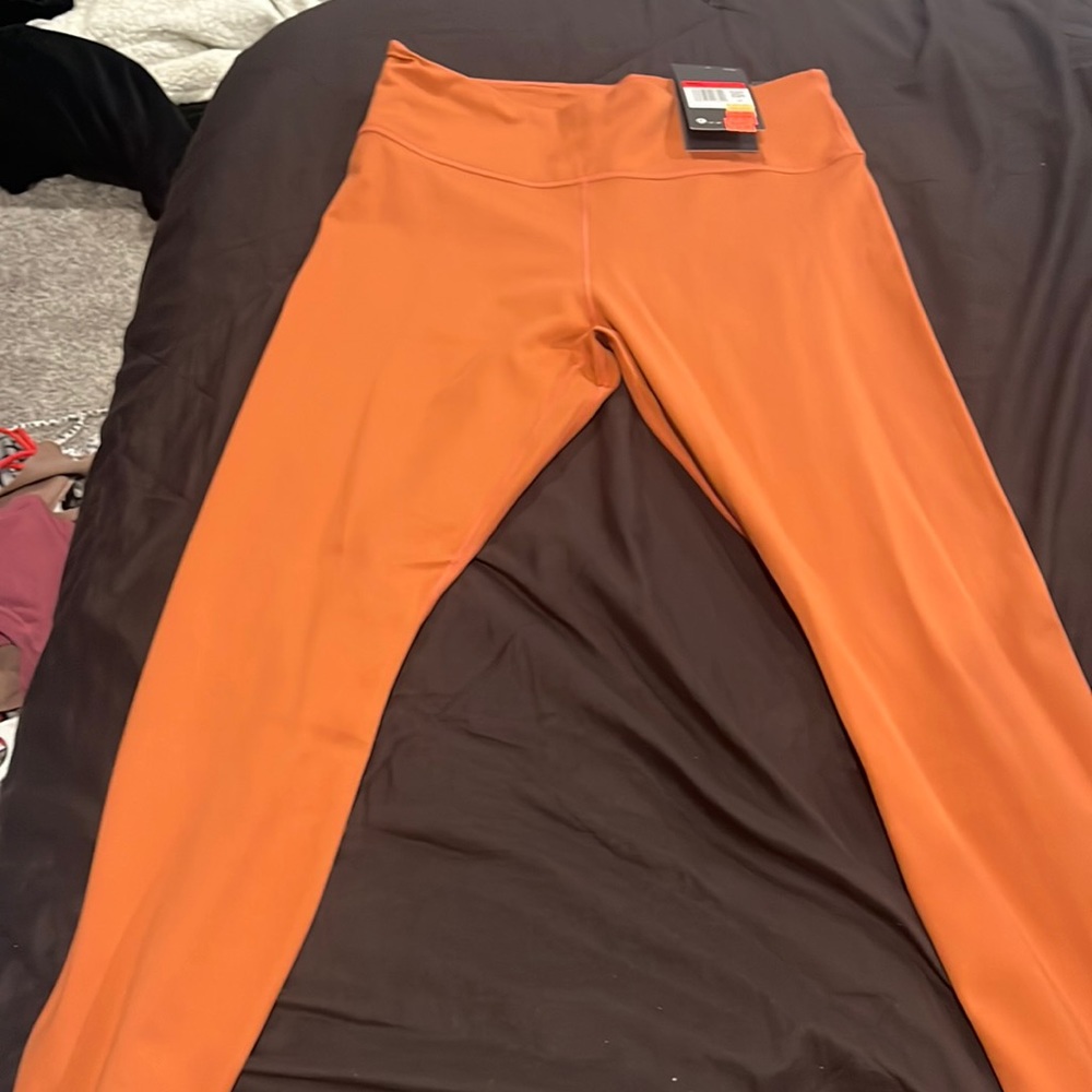 orange nike leggings
